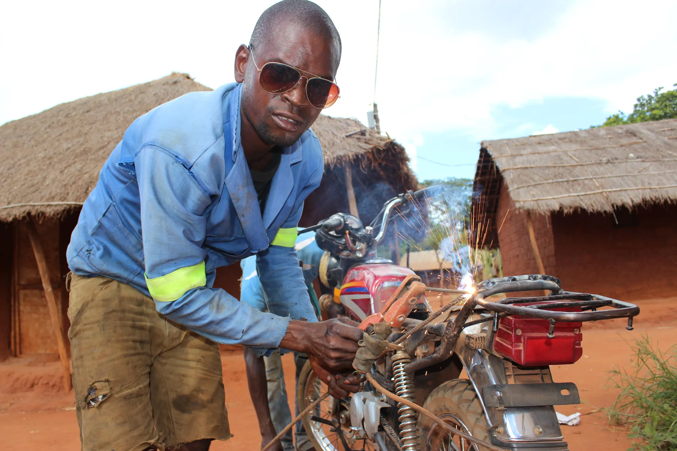 fixing the broken motorbike