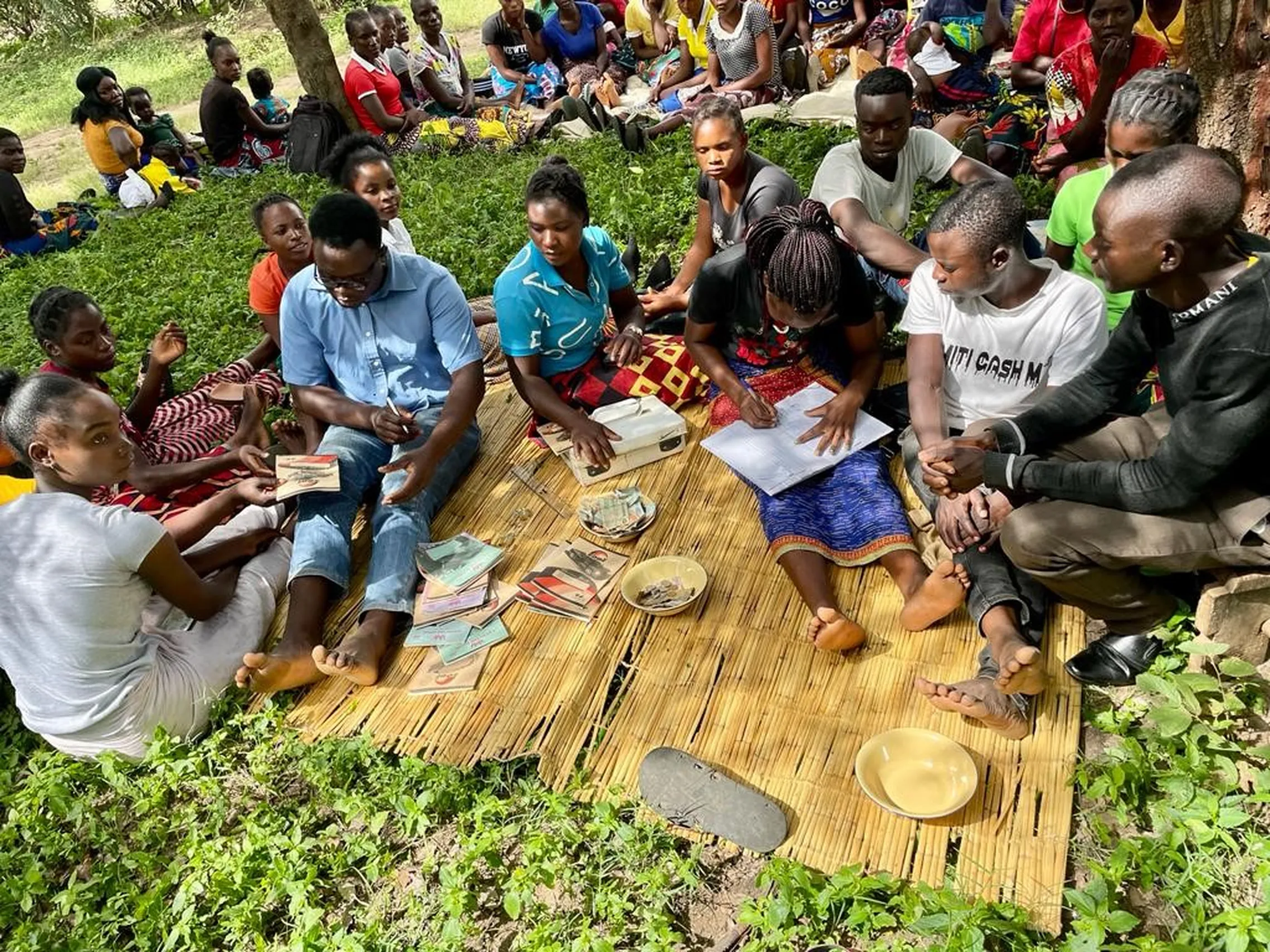 people gathering for a savings group