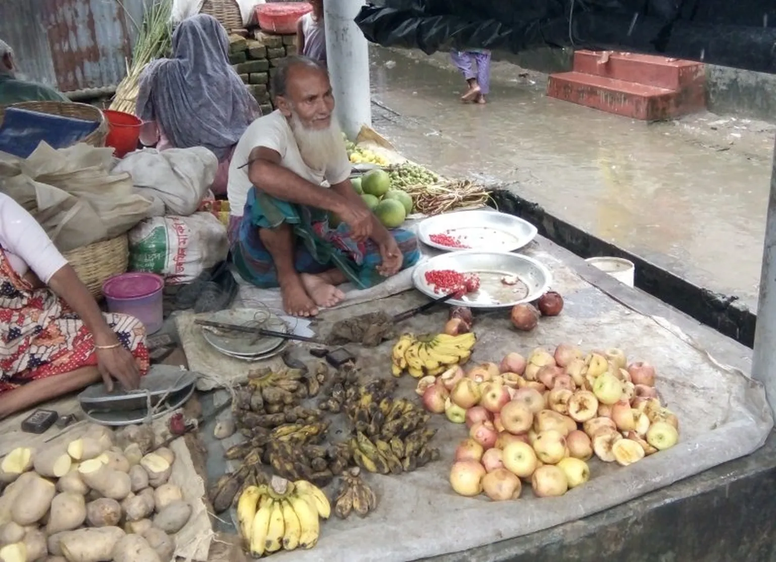 A vendor selling cheap "gone-off" fruit