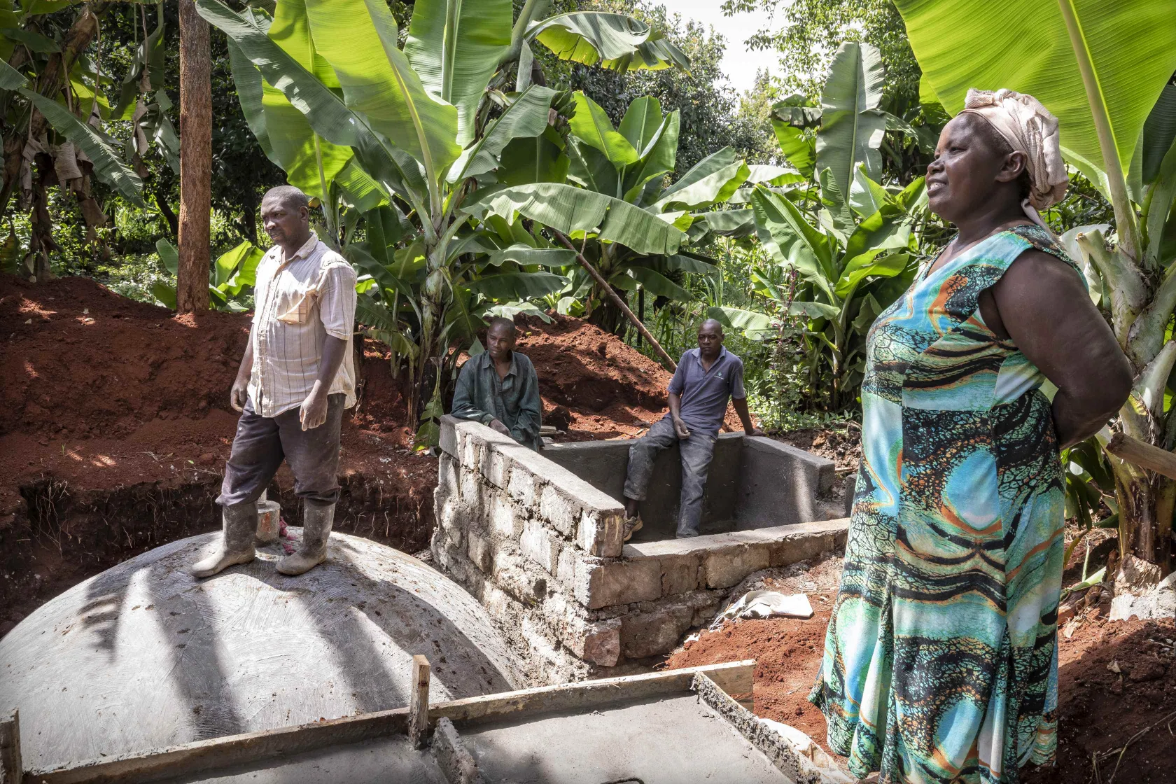 Man standing on biodigester in kenya