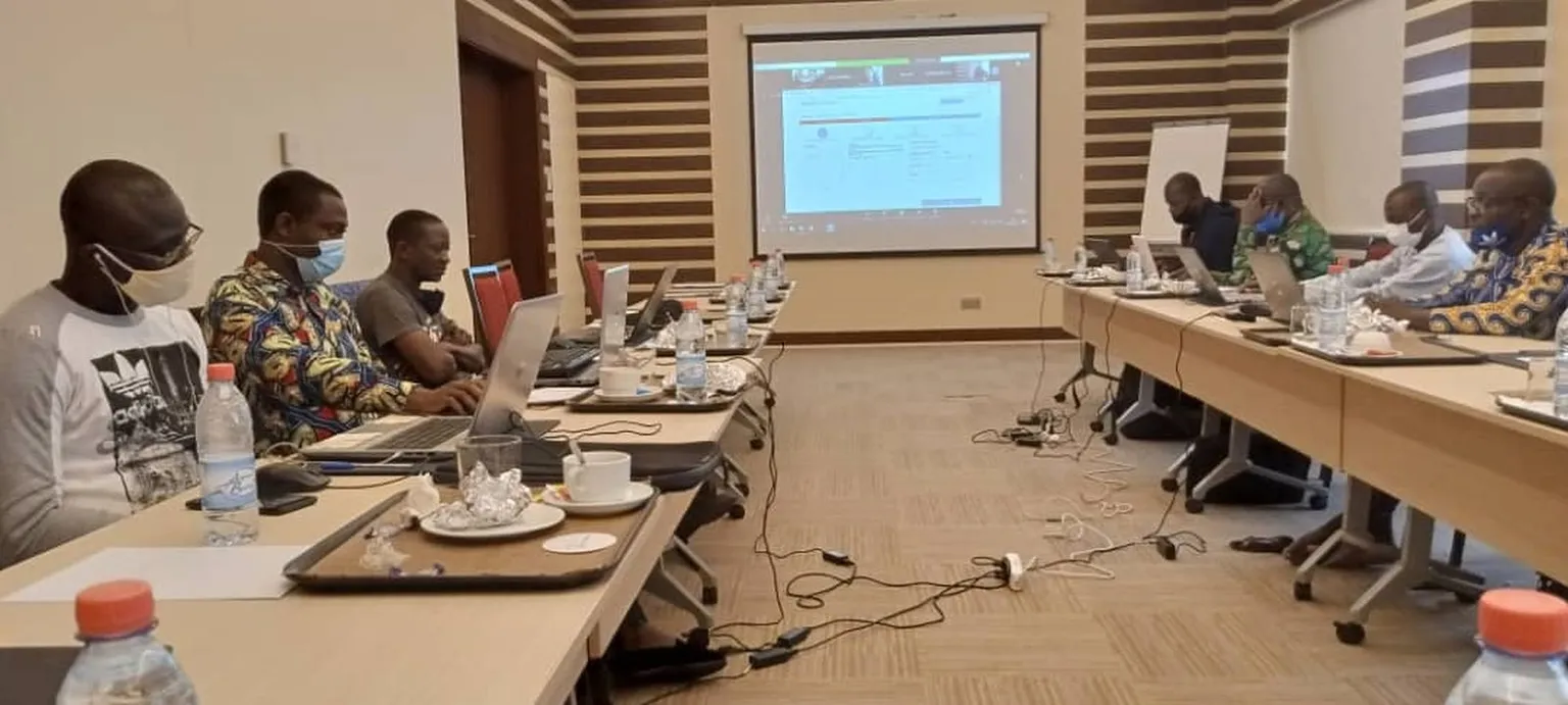 Group of men working in office