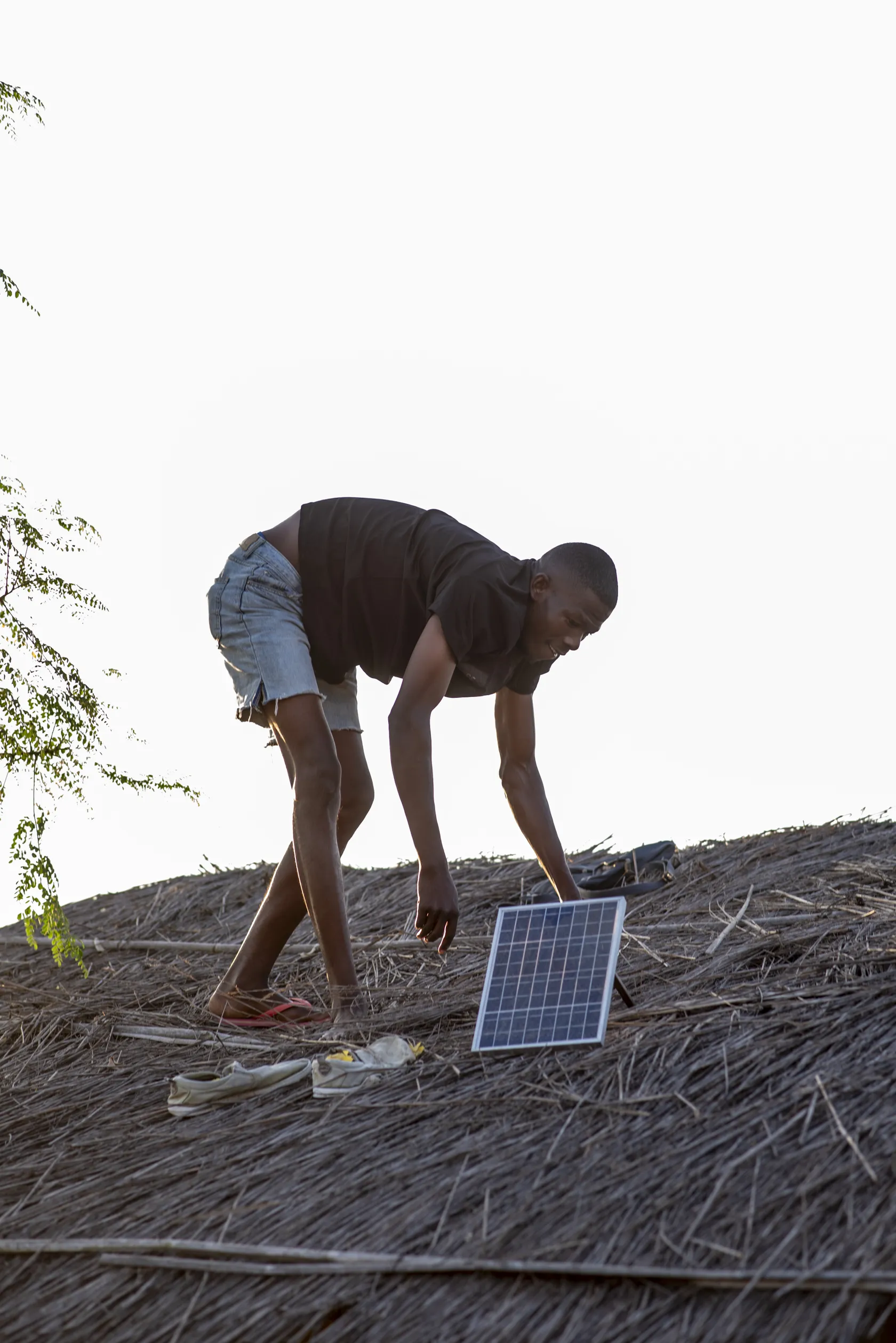 man installing solar panel