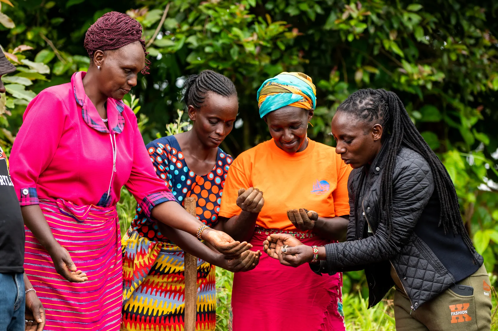 Women looking at seeds