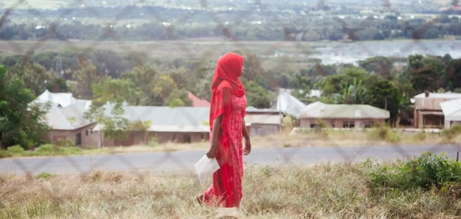 Woman in red clothes walking