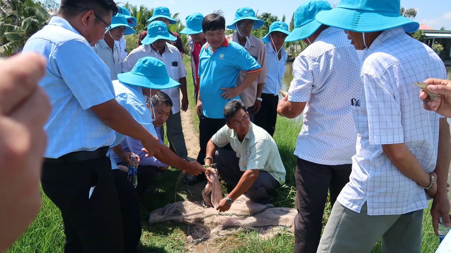 Farmers showcasing fishing nets