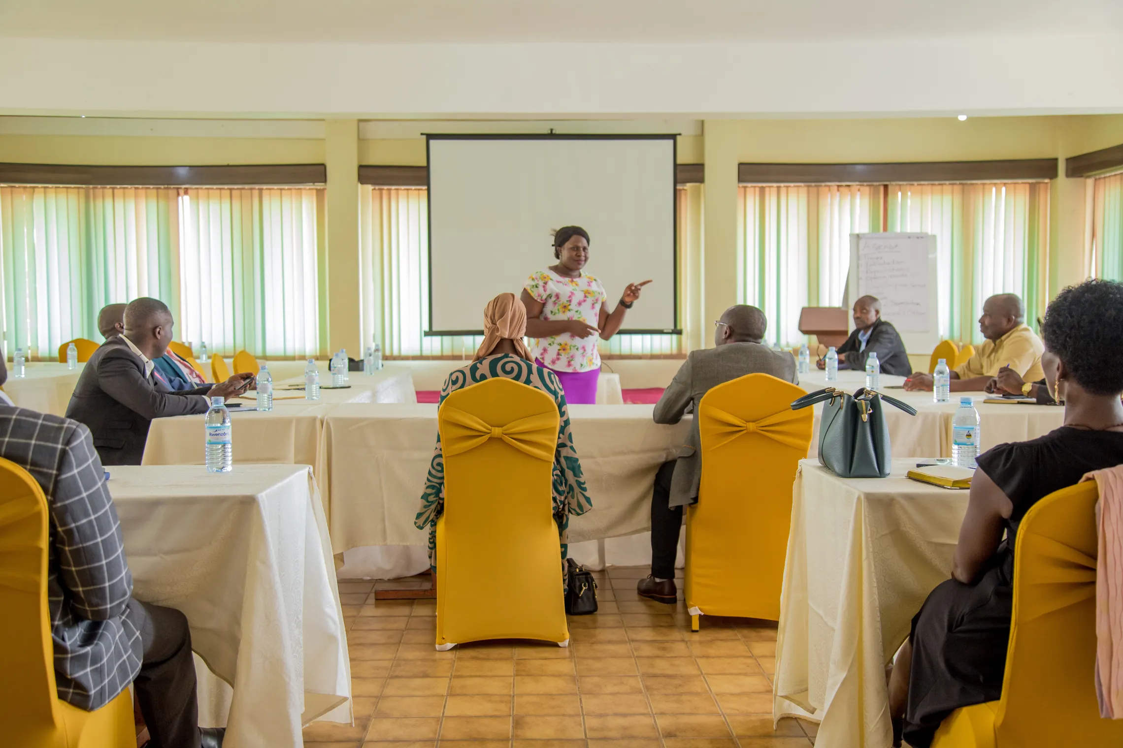 A group of stakeholders in Uganda address school feeding from a systems lens