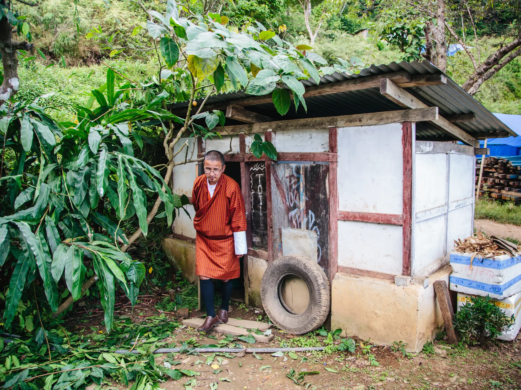 Man uses toilet in Dagana, a rural district in Bhutan.