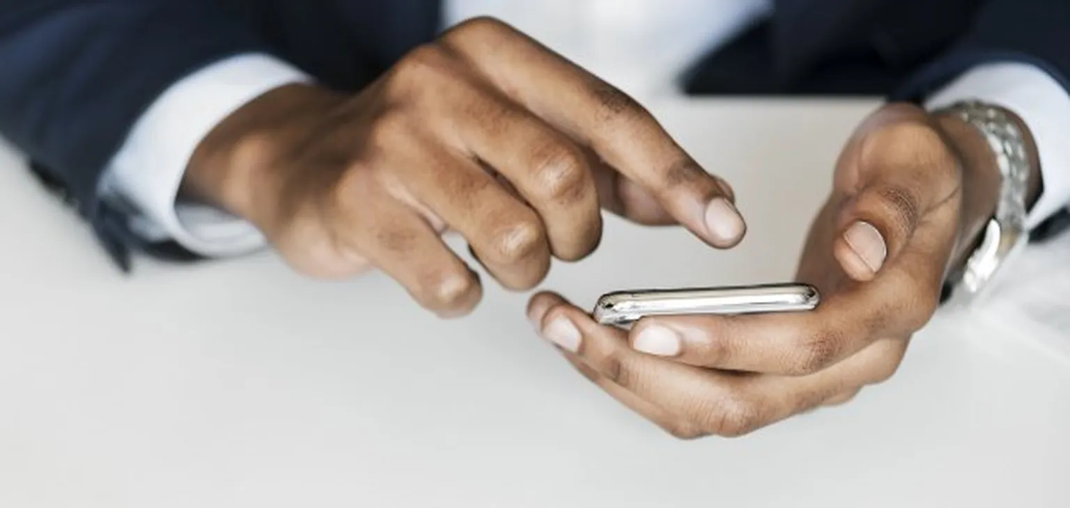 Close up of phone being held