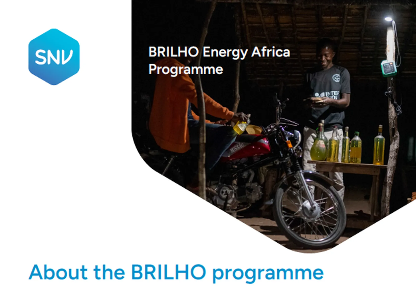 Man charging a motorcycle battery under a thatched roof, surrounded by bottles, with a bright light overhead. Text: "BRILHO Energy Africa Programme."