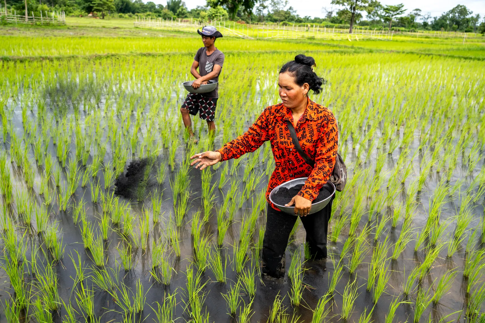 Woman with HUSK biochar in Cambodia Mondulkiri province