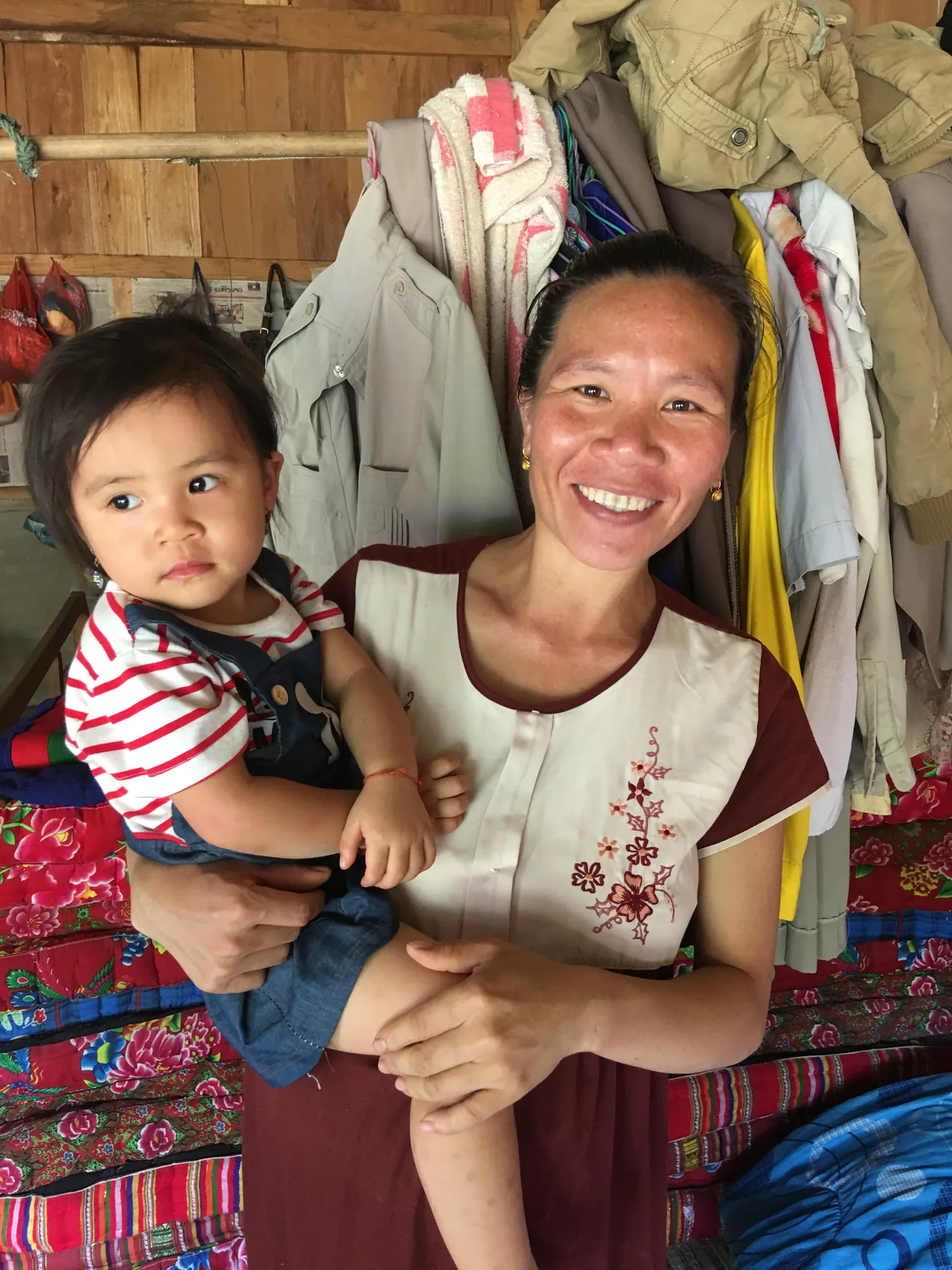 Mrs.Saikham 8 months pregnant with her 2.5-year-old daughter