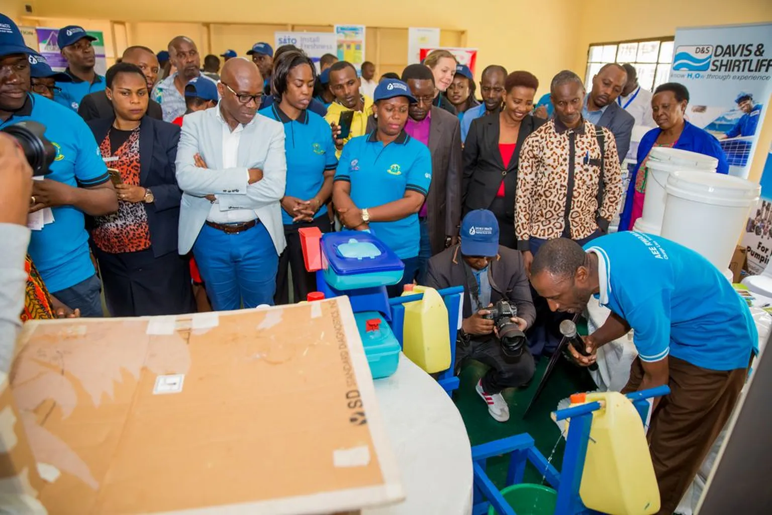 Different sanitation products are explained to the opening's audience