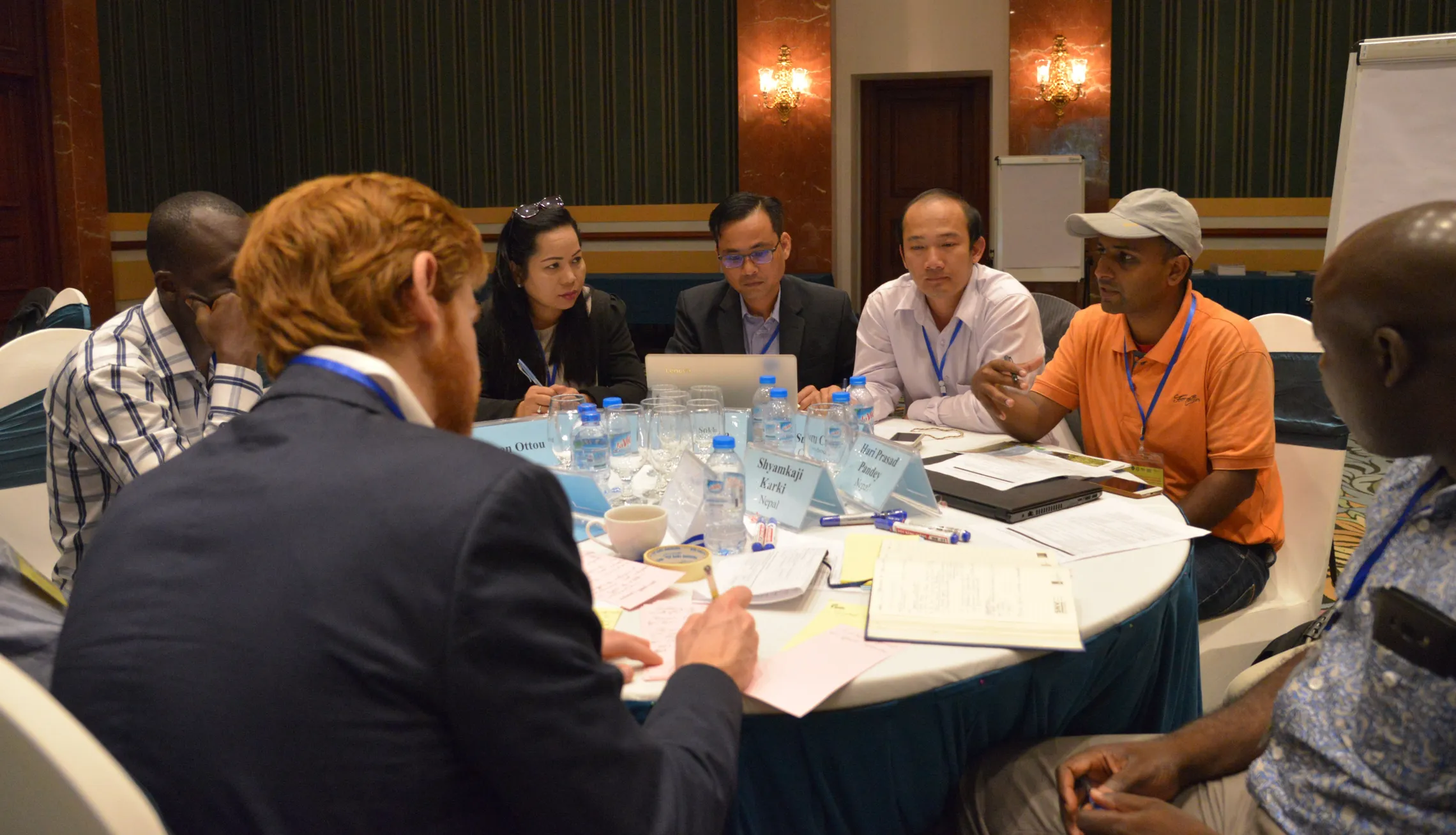 Participants from different countries sharing experiences and approaches