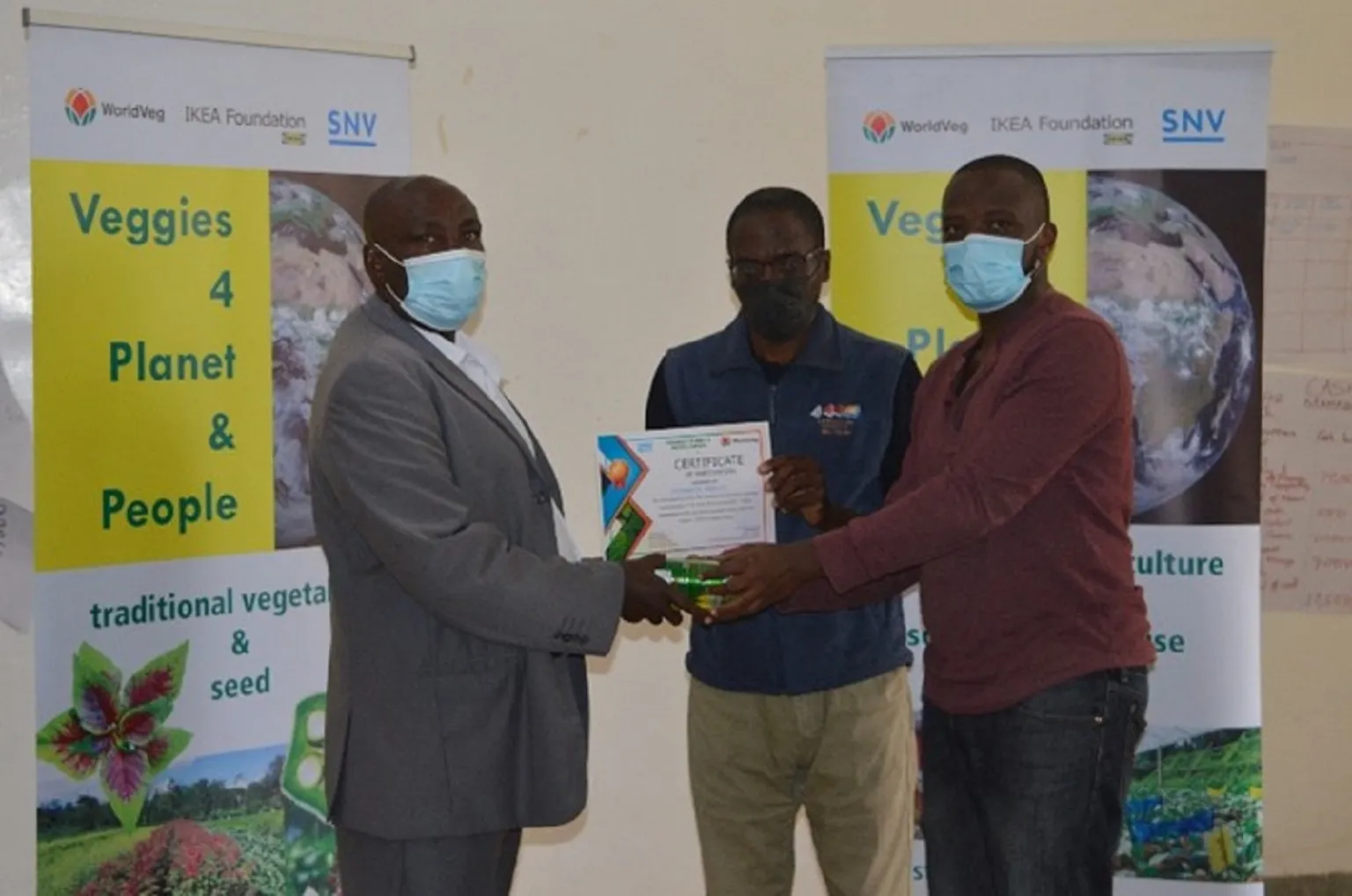 Participants receiving their certificate