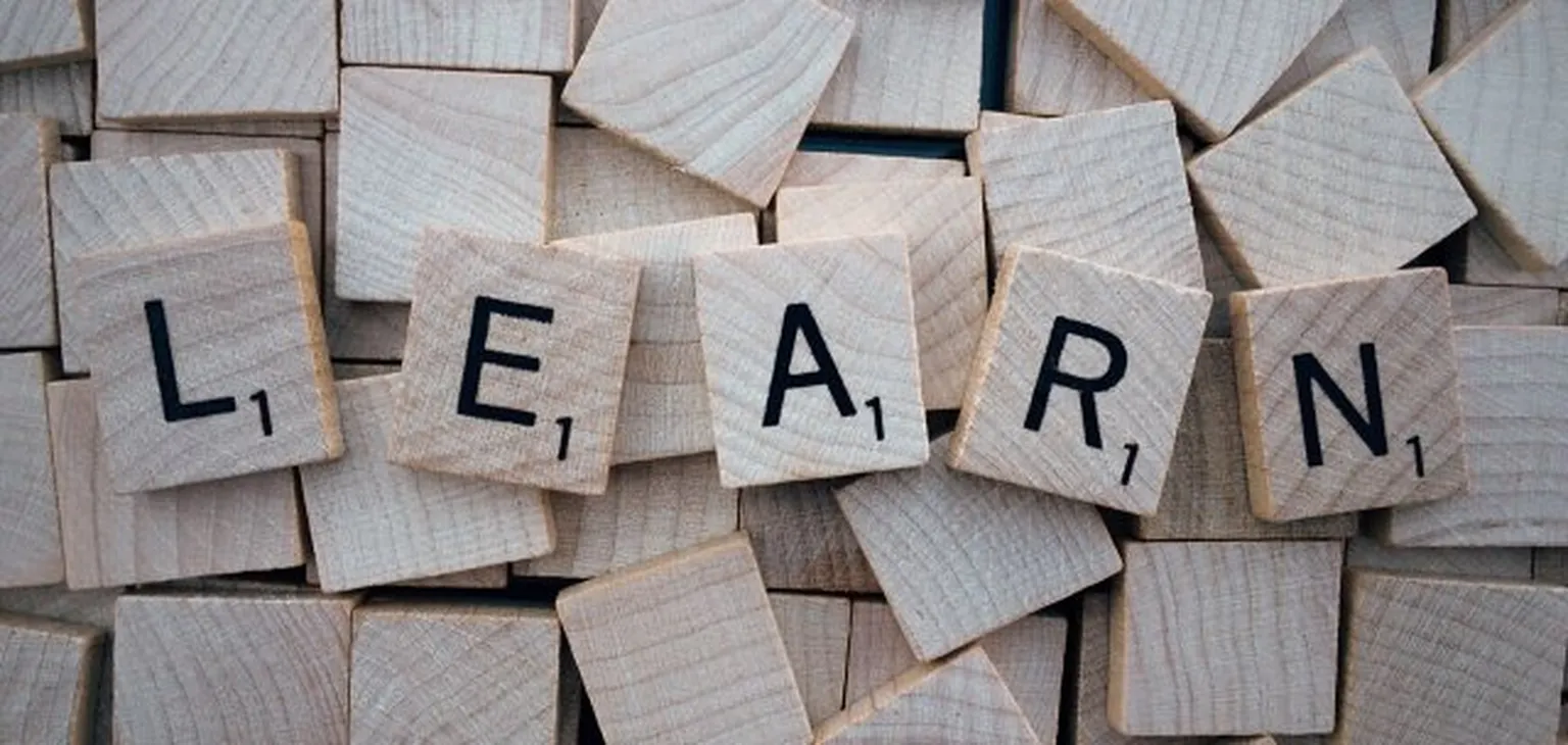 Learn spelled in Scrabble letters