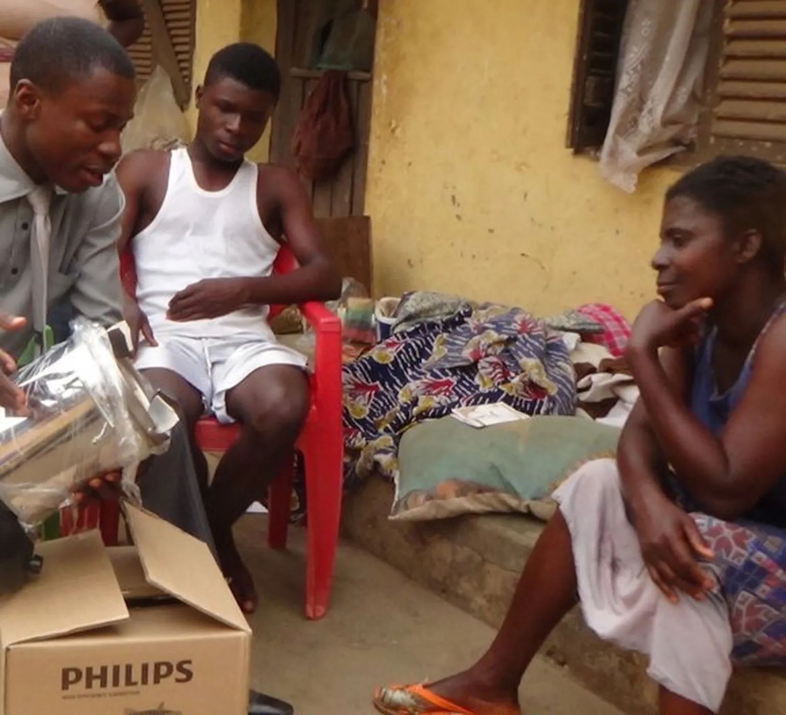 people unboxing cookstoves