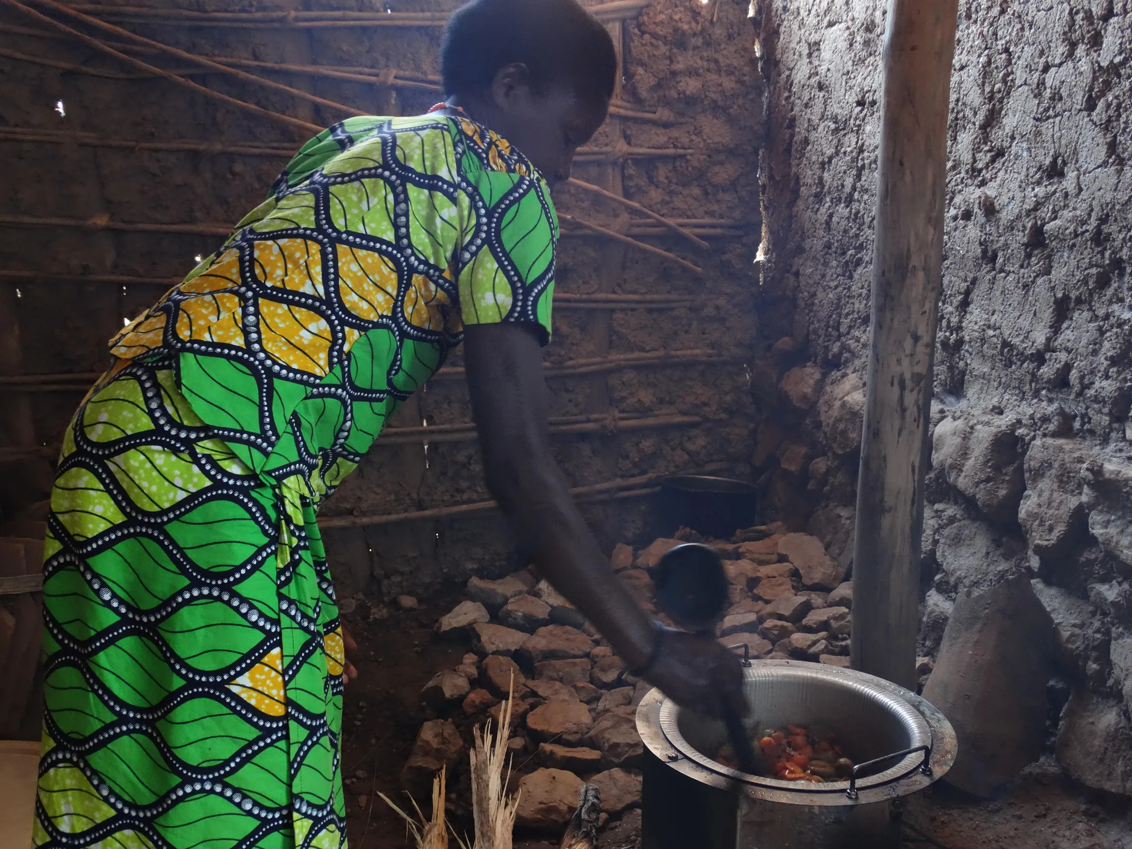 Esperance preparing lunch on her Save80 stove, saving fuel and time