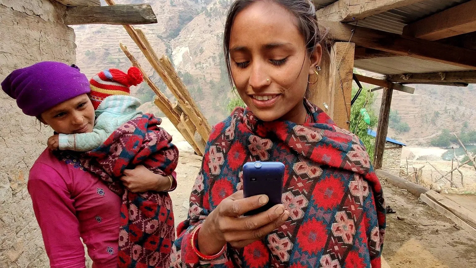 Mobile phone user in Mugu (Photo: Suyog Raj Chalise, 2021)