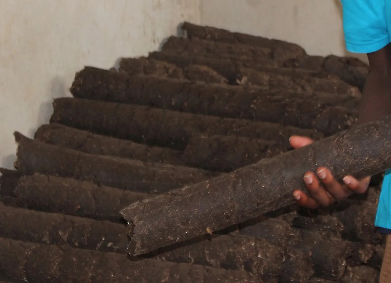 Joyce - earning a living making briquettes