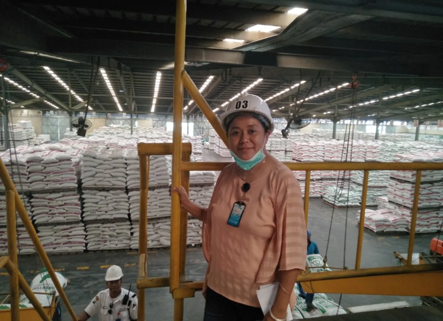 Marni visits a pig feed factory as part of her SNV training
