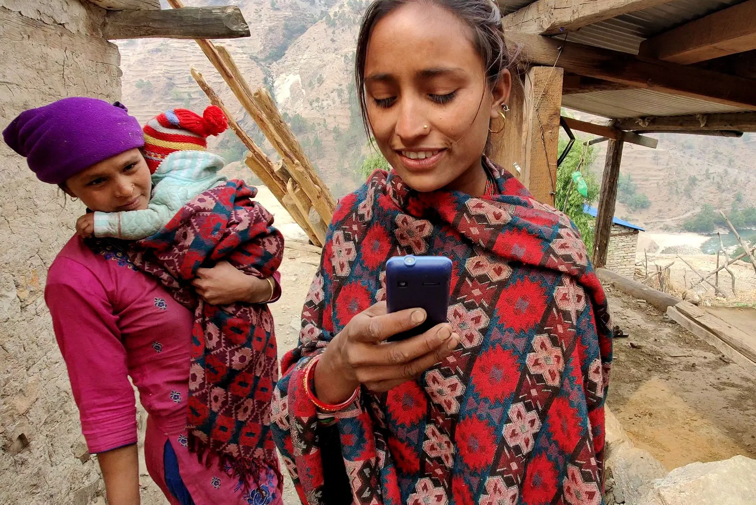 Mobile phone user in Mugu (Photo: Suyog Raj Chalise, 2021)