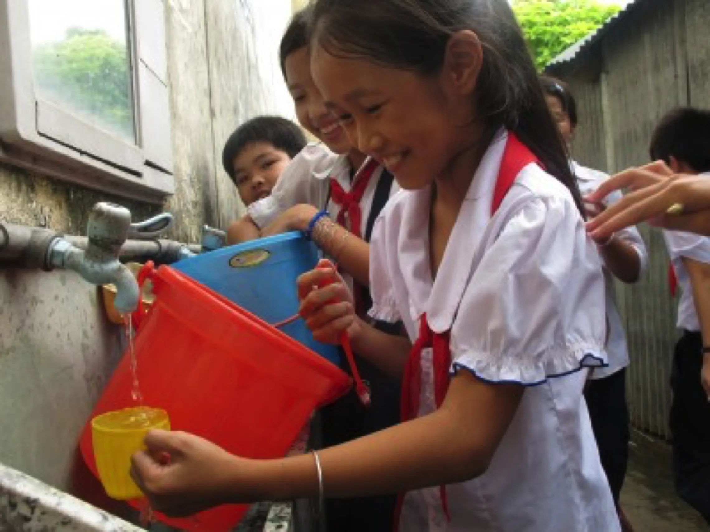 chidren getting clean water